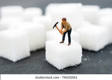 Miniature People Working With Sugar. Health Care Concept. Diet, Fat And Diabetes. Health Care Concept.