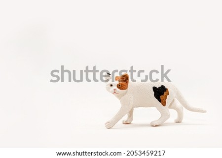 Miniature pet toys Cats  Isolated on White Background. 