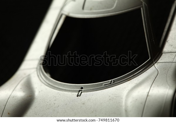 Miniature plastic\
model sport car body\
part.