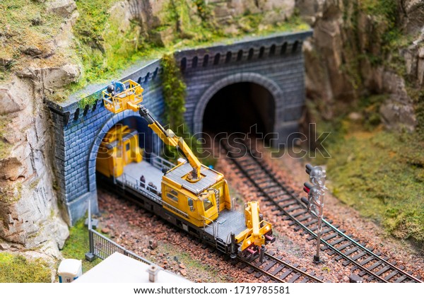 Miniature repair on railway\
tracks.