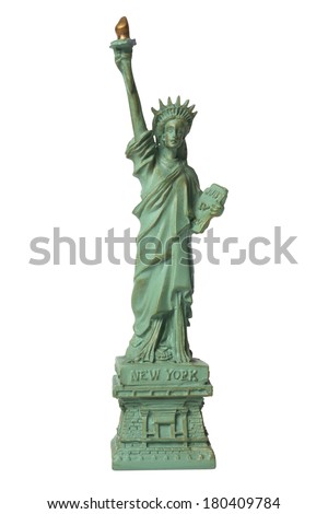miniature replicate of the statue of liberty on white 
