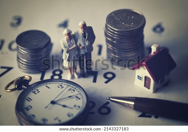 Miniature senior couple\
and life planning