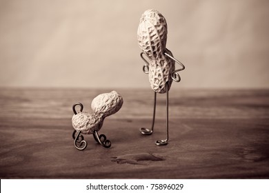 Miniature Still-Life With Peanut Man And Dog