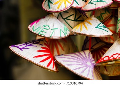 Miniature Straw Hats Key Chain With Thread Design On Display For Sale At Saigon Central Post Office Trinkets Store, Best Souvenir For Tourist To Bring Back From Vietnam And Ho Chi Minh City