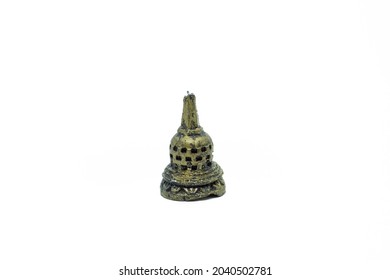 Miniature stupa of Borobudur Temple made of brass for key chains, isolated on white background