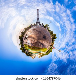 Miniature tiny planet of Scenic panorama of the Eiffel Tower in Paris, France. 360 degree panoramic view