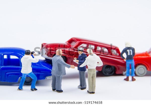 Miniature tiny toys car crash accident\
damaged.Accident on the road\
background