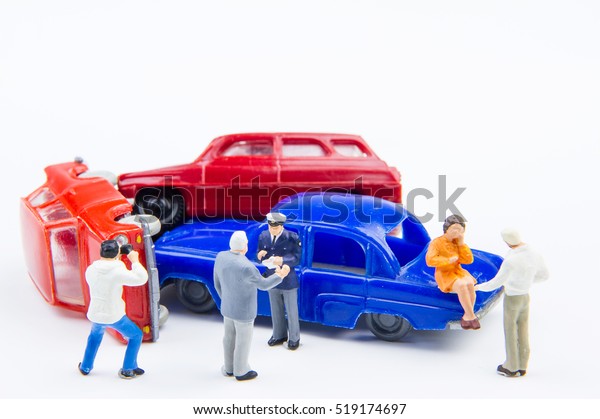 Miniature tiny toys car crash accident
damaged.Accident on the road
background
