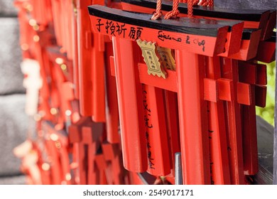 Miniature torii gates are small replicas of the traditional Japanese gates typically found at the entrance to Shinto shrines. - Powered by Shutterstock