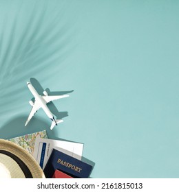 Miniature toy airplane, paper clouds and travel accessories on colorful background. Travel, vacations, tourism, airlines, low cost flights concept. Top view, flat lay. - Shutterstock ID 2161815013