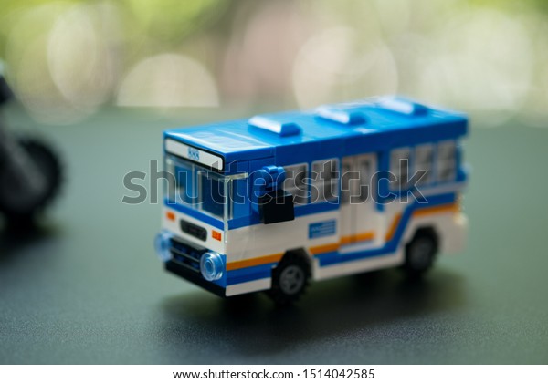 Miniature\
toy bus. People travel by bus in Bangkok. Buses are one of the most\
important public transport system in\
Bangkok.