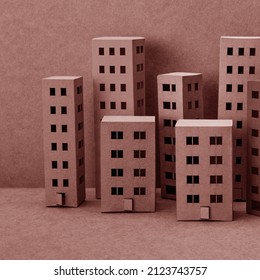 Miniature Toy City Paper Houses. Brown Monochrome Color. Abstract Urban Architecture, Simplified Town Layout With High-rise Buildings, Skyscrapers With Many Windows.