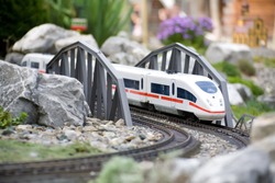 Miniature Toy Model Of Modern Train Crossing Bridge