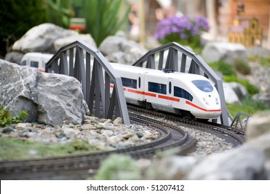 Miniature Toy Model Of Modern Train Crossing Bridge