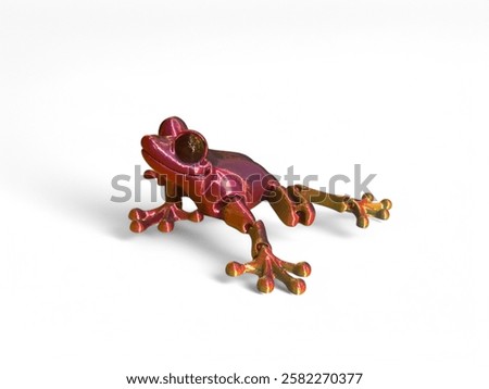 Miniature toy shaped like a red frog with a white background