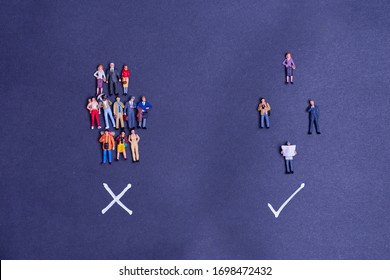 Miniature toys - social distancing or physical distancing conceptual image, people distancing each other in public places to avoid infection - the wrong way and the correct way.