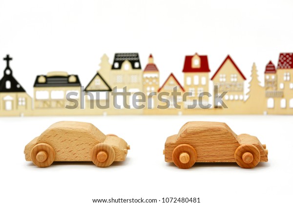 Miniature wooden cars and\
towns