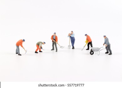 Miniature workers isolate on white background. copy space for placement your text