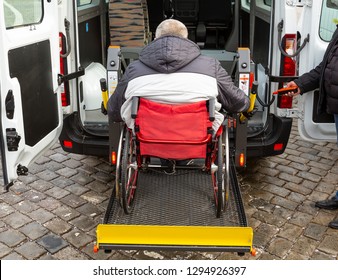 Minibus For Handicapped, Physically Challenged And Disabled People In Wheelchairs. Minibus With Stowed Wheelchair Ramp.
