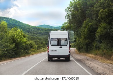 Minibus Rides Outdoors On A Mountain Road