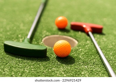 Mini-golf ball on artificial grass. Summer season game - Powered by Shutterstock