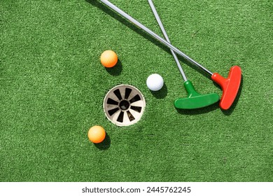 Mini-golf ball on artificial grass. Summer season game - Powered by Shutterstock