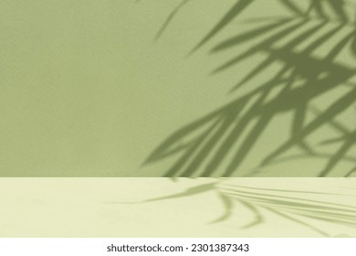 Minimal abstract background for the presentation of a cosmetic product. Empty premium podium with a shadow of tropical palm leaves on a green background. Showcase, display case. - Shutterstock ID 2301387343