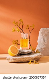 Minimal abstract cosmetic orange background for product presentation. stone, wood shape with lemon yellow ingredients shades over concept background. Can use as perfume and cosmetics mock up.