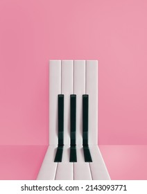 Minimal aesthetic composition of melodie. Piano keys arranged in abstract, rectangular shape on isolated pastel pink background. Music concert creative card. Entrance ideas. Piano keyboard concept.