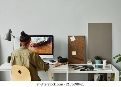 Minimal Back View Of Female Photographer Editing Photos At Workplace In Studio, Copy Space