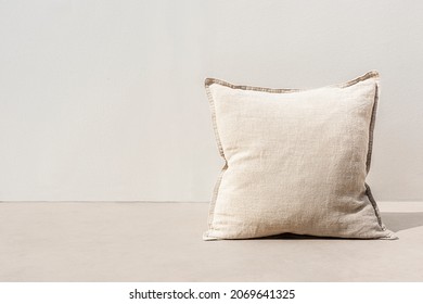 Minimal beige printed cushion on interior design