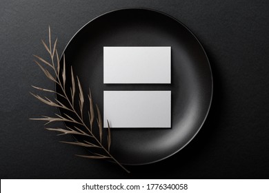 Minimal business card mockup on black plate