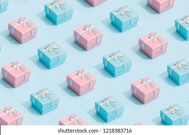 Minimal composition background of pastel pink and blue Christmas gift box. New Year concept.
