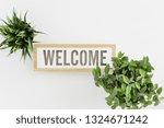 Minimal Creative Top View Work Space Flat Lay with Welcome sign