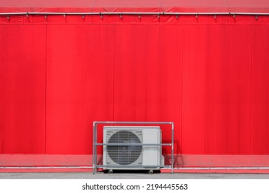 Minimal Exterior Architecture Background Of Air Conditioner Compressor On The Floor With Light Blubs Decoration Outside Of Red Event Tent