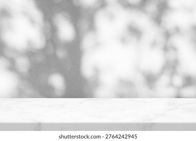 Minimal Marble Tabletop with Tree Shadow on Concrete Wall Texture Background, Suitable for Product Presentation Backdrop, Display, and Mock up.