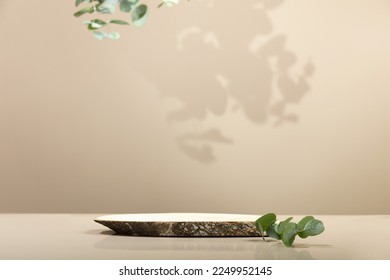 Minimal modern product display on neutral beige background. Wood slice podium and green leaves. Concept scene stage showcase for new product, promotion sale, banner, presentation, cosmetic - Shutterstock ID 2249952145