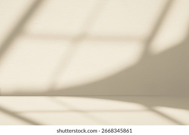 Minimal studio background,Soft sunlight of window frame shadow on warm beige wall and floor.Clean and modern abstract backdrop for product display,interior design mockup,presentations,branding visuals