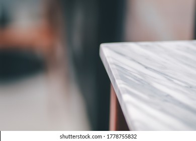 Minimal Style And Copy Space For Working.Blurred Close-up Of A Luxurious Marble Table Corner.Template Mock Up For Display Or Montage Of Product