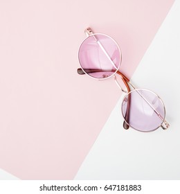 Minimal Style. Minimalist Fashion Photography. Vintage. Glamour. Pink Sunglasses On Pastel Backgrounds. Flat Lay