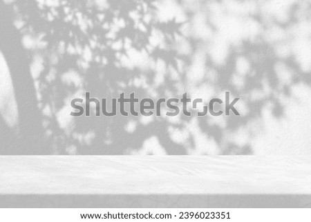 Minimal White Loft Table with MapleTree Shadow on Concrete Wall Texture Background, Suitable for Product Presentation Backdrop, Display, and Mock up.