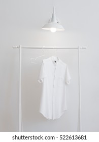 Minimal White Shirt Hang On Clothes Rack