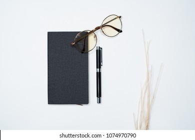 Minimal work space Creative flat lay with fashion object on white background workspace desk