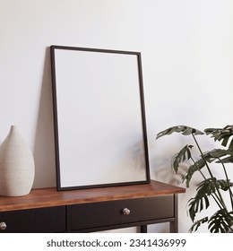 minimalist aesthetic frame mockup poster template on the table leaning on the white wall from side angle. wall in modern interior background. 50x70, 20x28, 20RP frame mockup poster