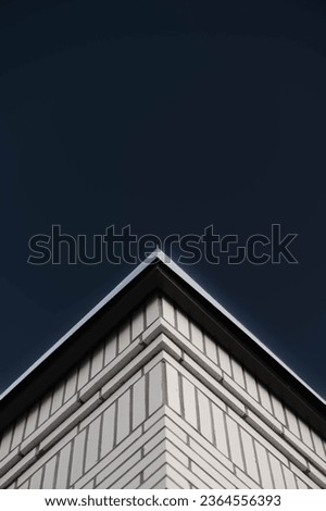 Similar – Roofs against the evening sky