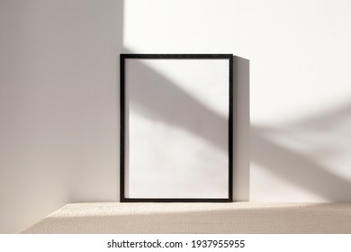 Minimalist Black Frame Mockup On White Background With Shadow