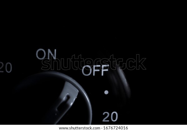 Minimalist black image of a on/off\
turn switch set to off position: mental stimulation\
concept