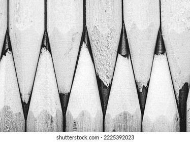 Minimalist close-up macro photography of a pencils. Black and white photography. Pencils lie next to each other