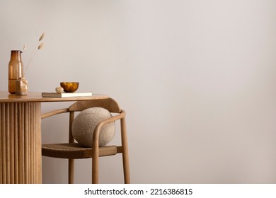 Minimalist composition of dining interior with round wooden table, design chair, copy space, kitchen stuff, decoration and personal accessories. Stylish home decor. Template.	
