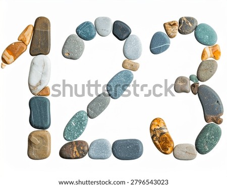 A Minimalist Composition of Natural Multi Colored River Pebbles Arranged Into Numerical Digits On Pure White Background